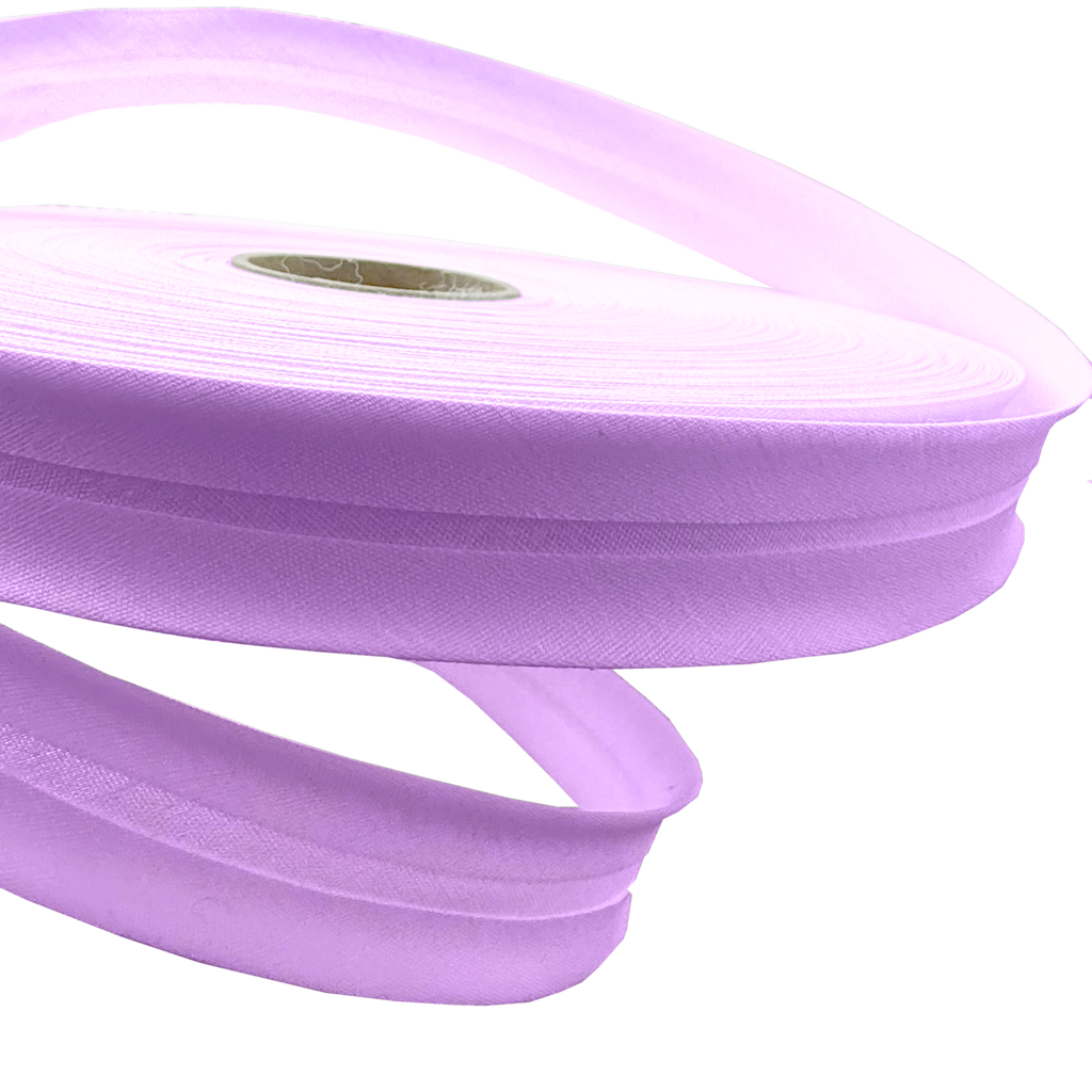 close up of the violet 1" no gap single fold bias tape on a roll from Heit's Wholesale bulk sewing supply company