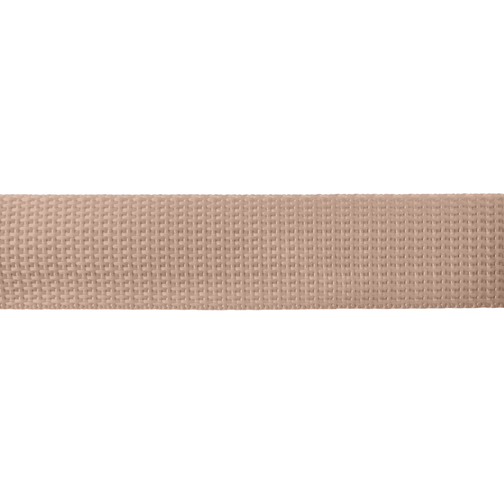 close up of the beige 1" polypro webbing on a spool from Heit's Wholesale bulk sewing supply company