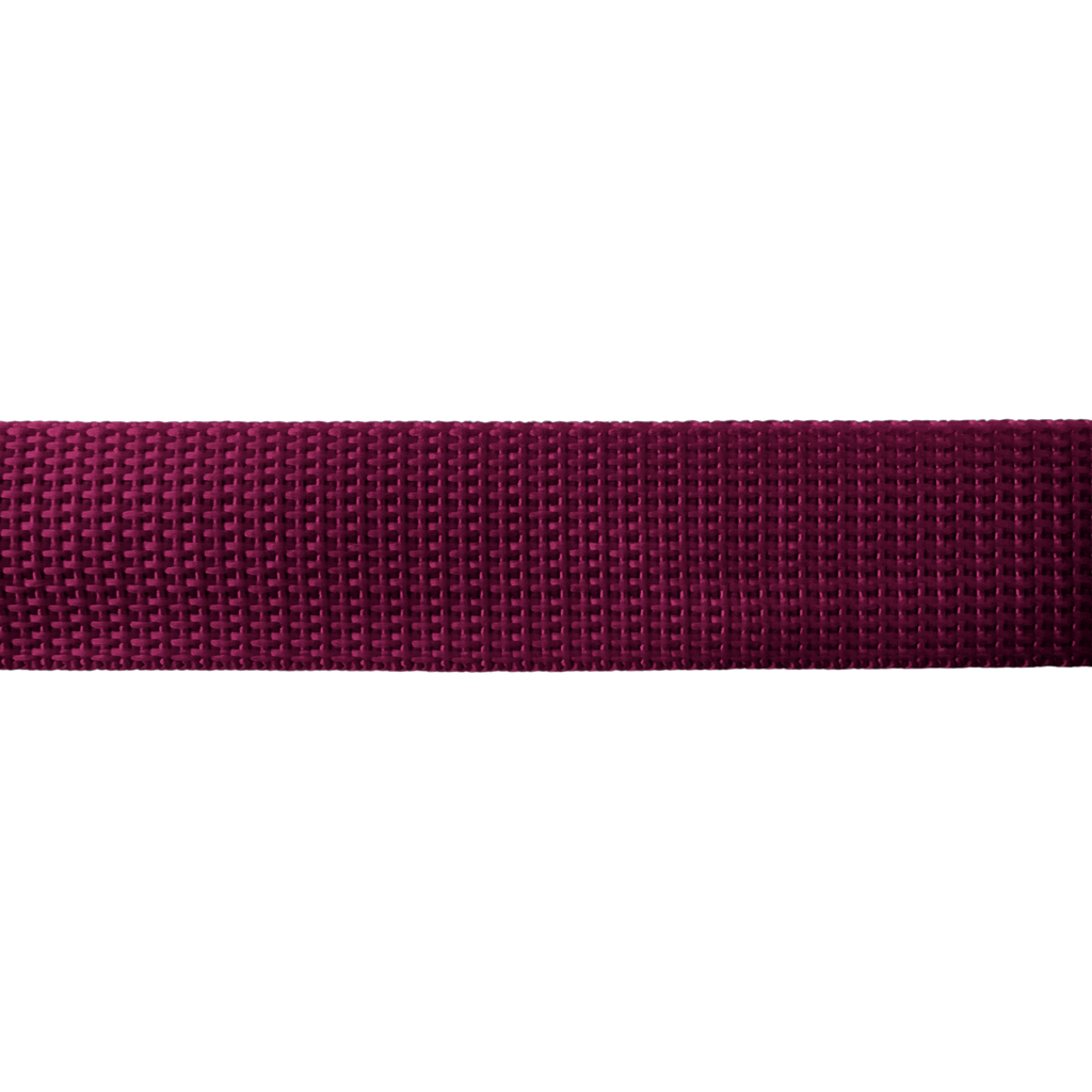 close up of the burgundy 1" polypro webbing on a spool from Heit's Wholesale bulk sewing supply company