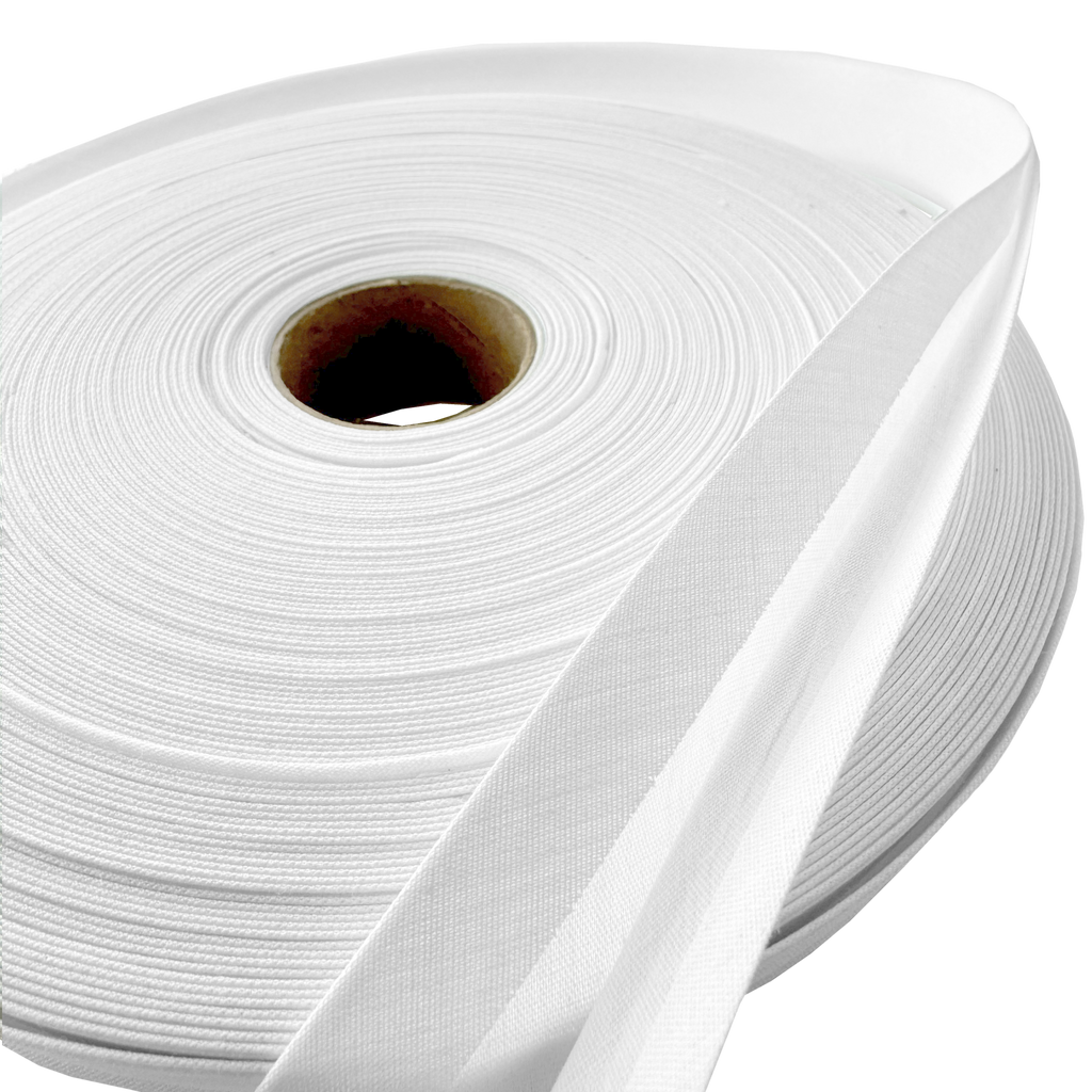 close up of the white 1" double fold bias tape on a roll from Heit's Wholesale bulk sewing supply company
