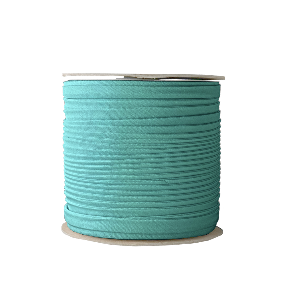 aquarius blue 3/8" double fold bias tape on a spool from Heit's Wholesale bulk sewing supply company 