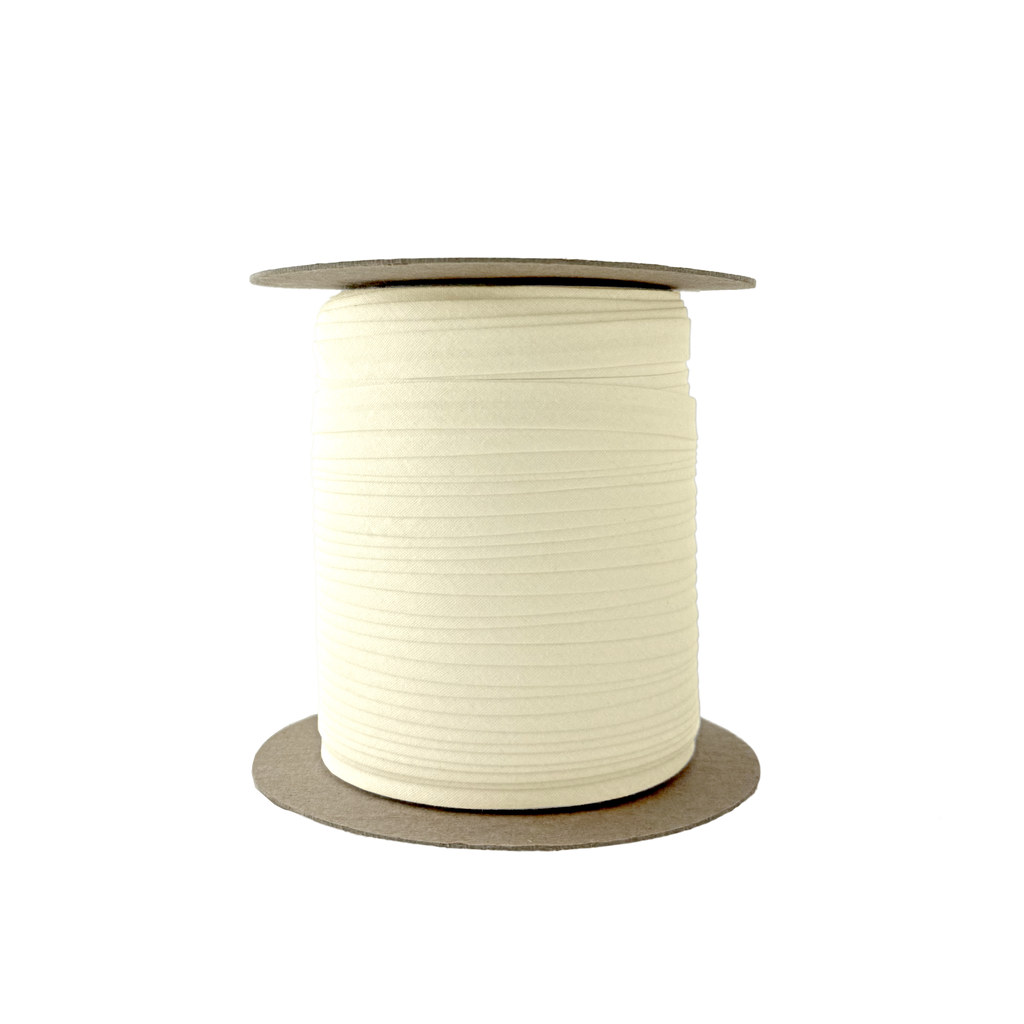 bamboo 3/8" single fold bias tape on a spool from Heit's Wholesale bulk sewing supply company