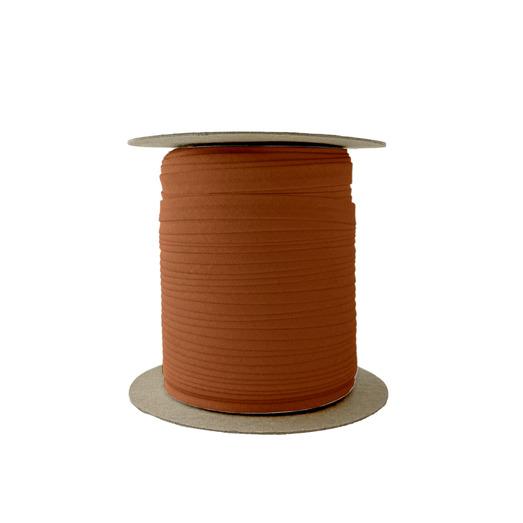 brown 3/8" single fold bias tape on a spool from Heit's Wholesale bulk sewing supply company