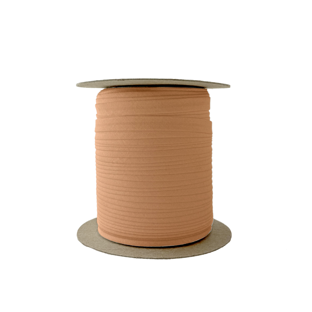 camel 3/8" single fold bias tape on a spool from Heit's Wholesale bulk sewing supply company