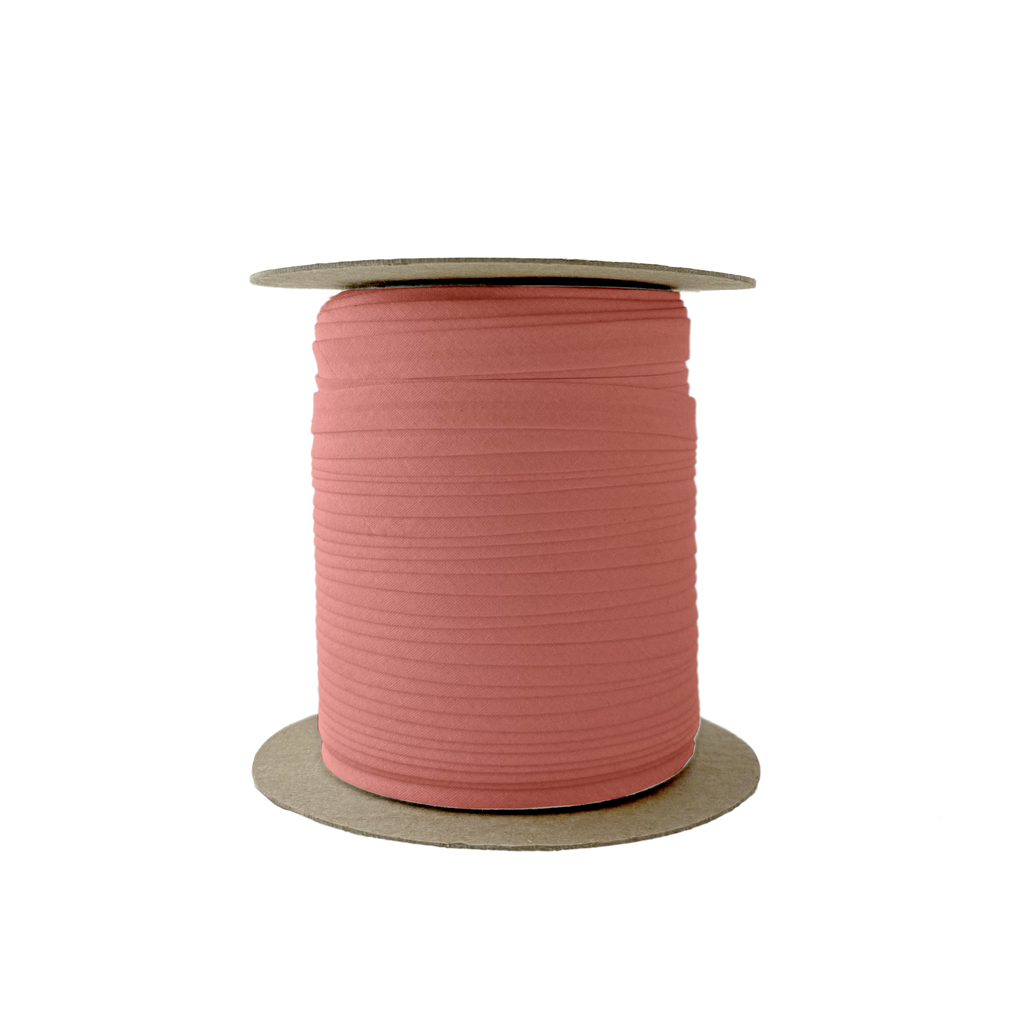 copper 3/8" single fold bias tape on a spool from Heit's Wholesale bulk sewing supply company