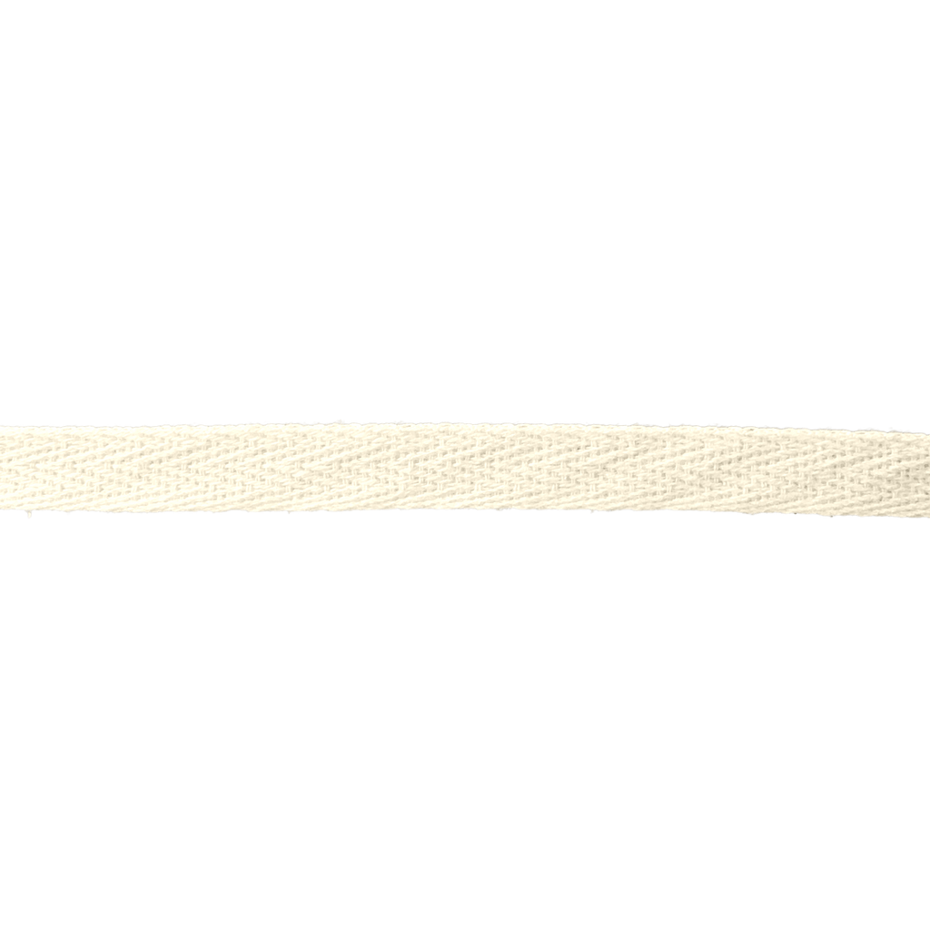 close up of the ivory 3/8" cotton twill tape on a spool from Heit's Wholesale bulk sewing supply company