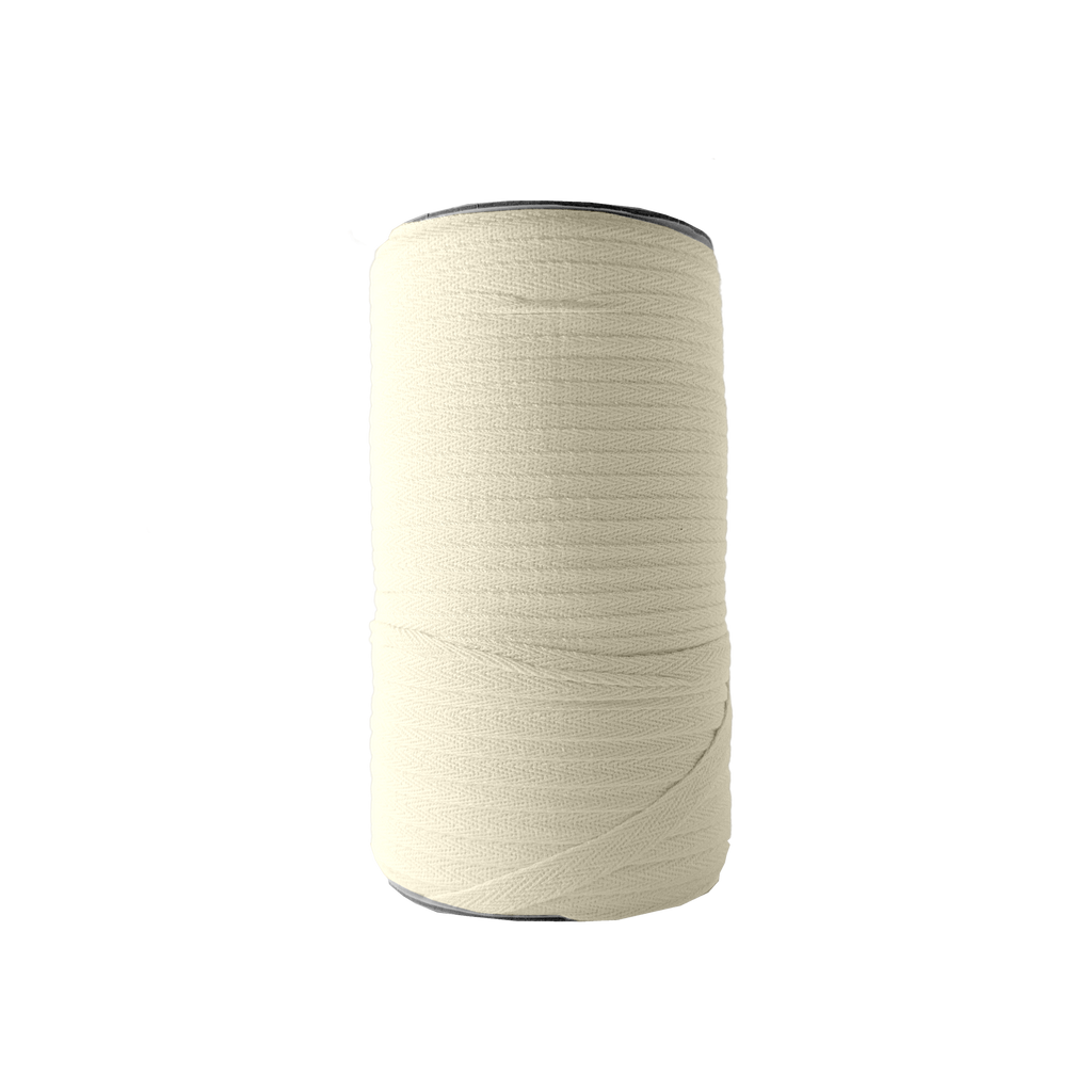 ivory 3/8" cotton twill tape on a spool from Heit's Wholesale bulk sewing supply company