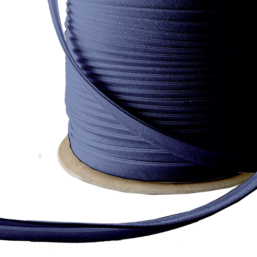 close up of the dark navy 3/8" double fold bias tape on a spool from Heit's Wholesale bulk sewing supply company 