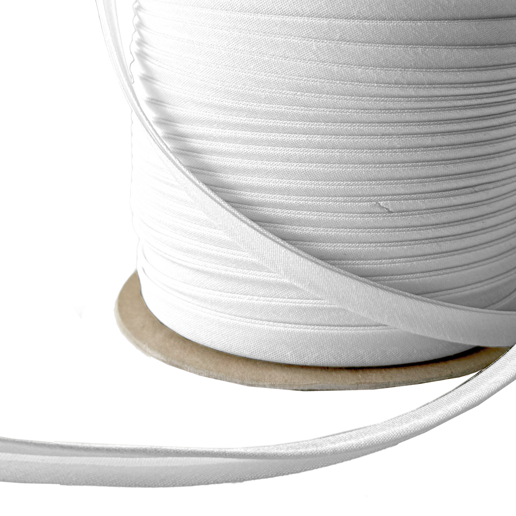 close up of the light gray 3/8" double fold bias tape on a spool from Heit's Wholesale bulk sewing supply company 