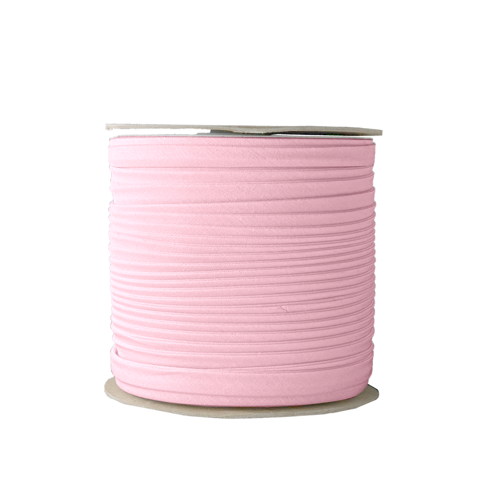 petal pink 3/8" double fold bias tape on a spool from Heit's Wholesale bulk sewing supply company 
