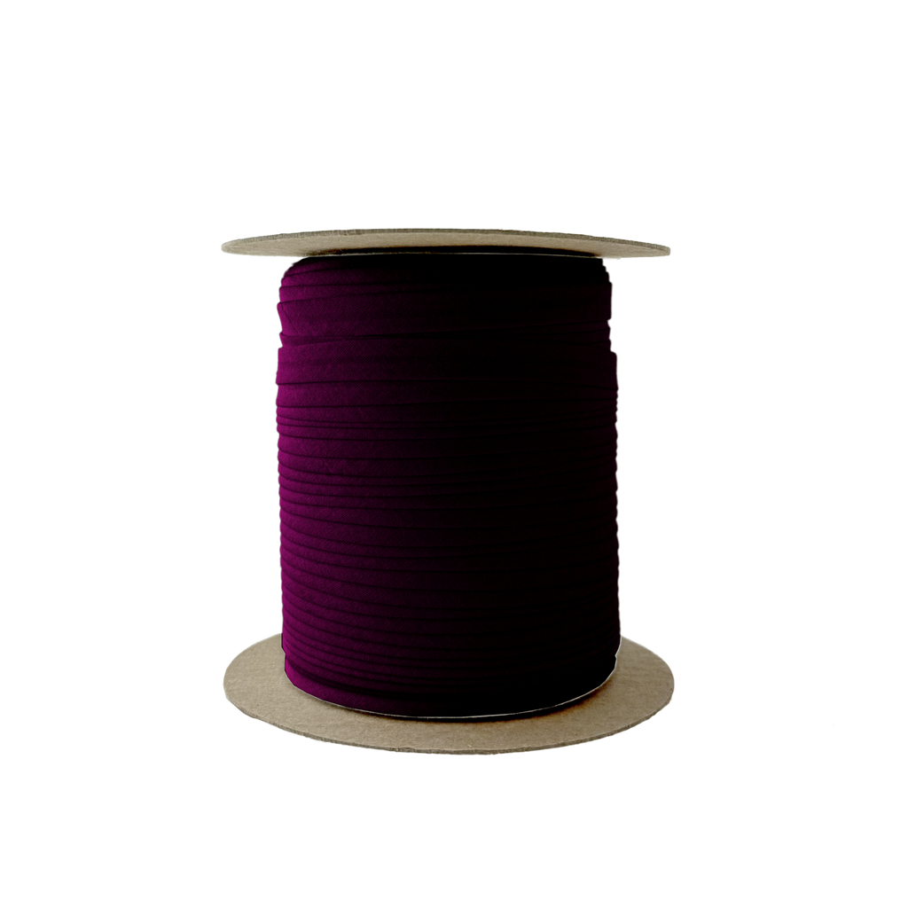 port wine 3/8" single fold bias tape on a spool from Heit's Wholesale bulk sewing supply company