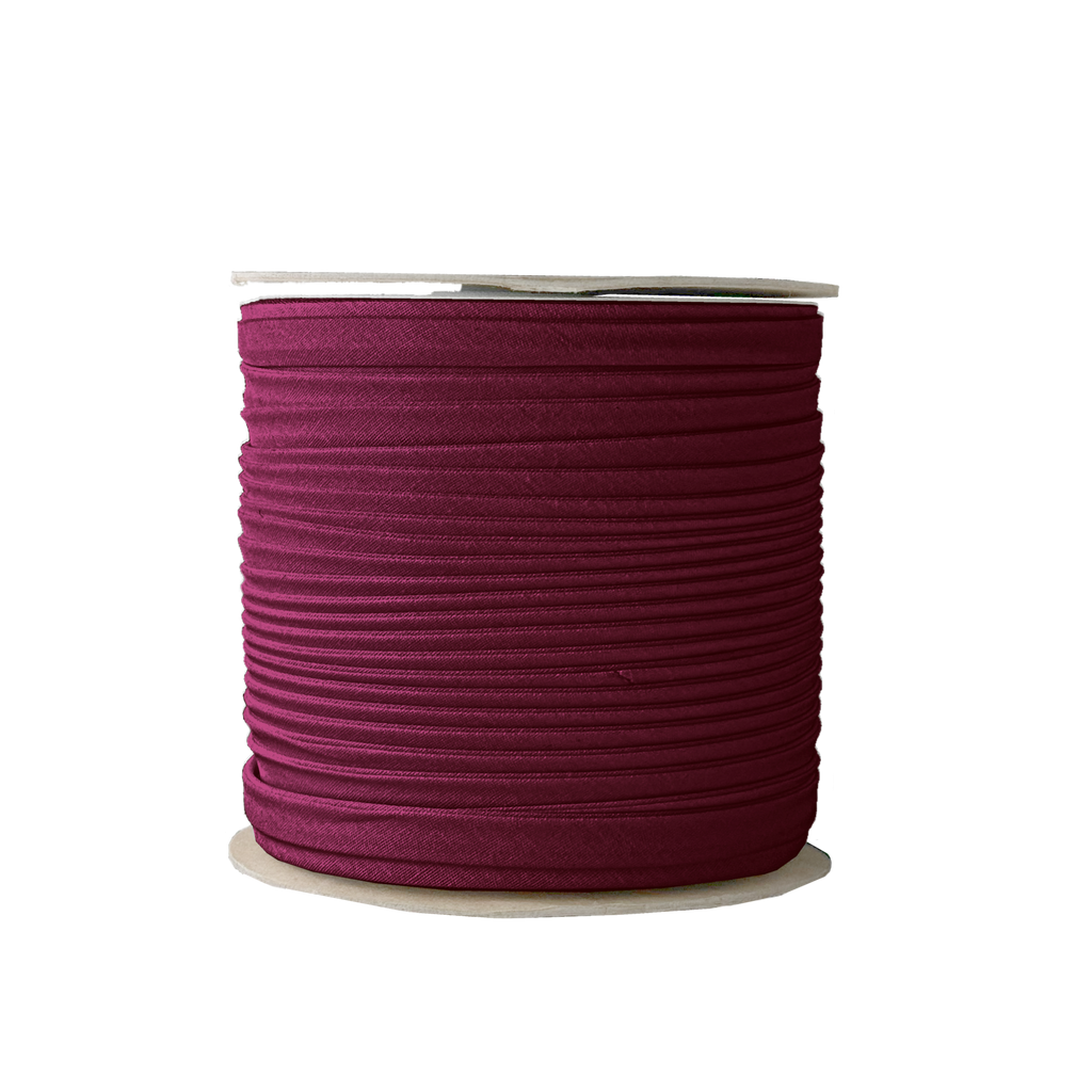 ruby 3/8" double fold bias tape on a spool from Heit's Wholesale bulk sewing supply company 