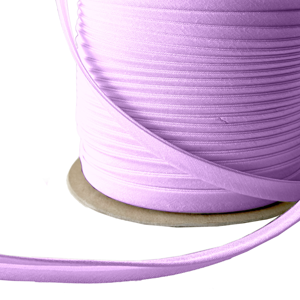 close up of the violet 3/8" double fold bias tape on a spool from Heit's Wholesale bulk sewing supply company 