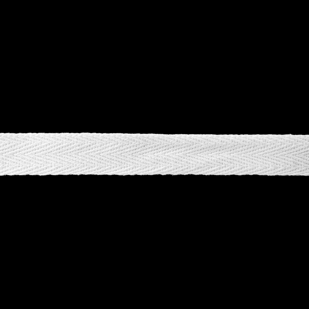 close up of the white 5/8" cotton twill tape on a spool from Heit's Wholesale bulk sewing supply company