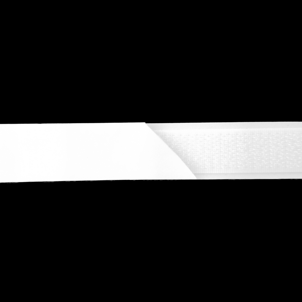 close up of the white 5/8" self adhesive velcro on a spool from Heit's Wholesale bulk sewing supply company