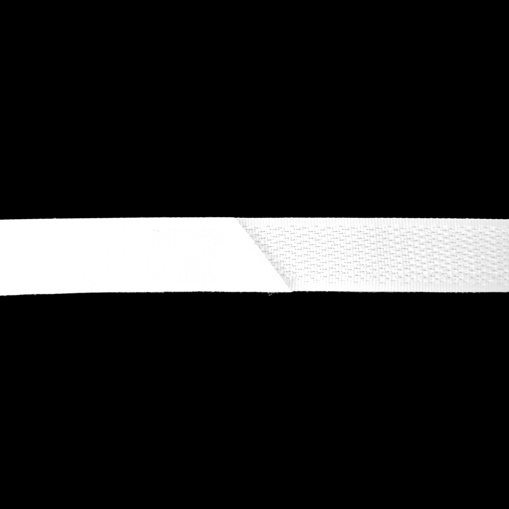 close up of the white 5/8" sew on velcro on a spool from Heit's Wholesale bulk sewing supply company