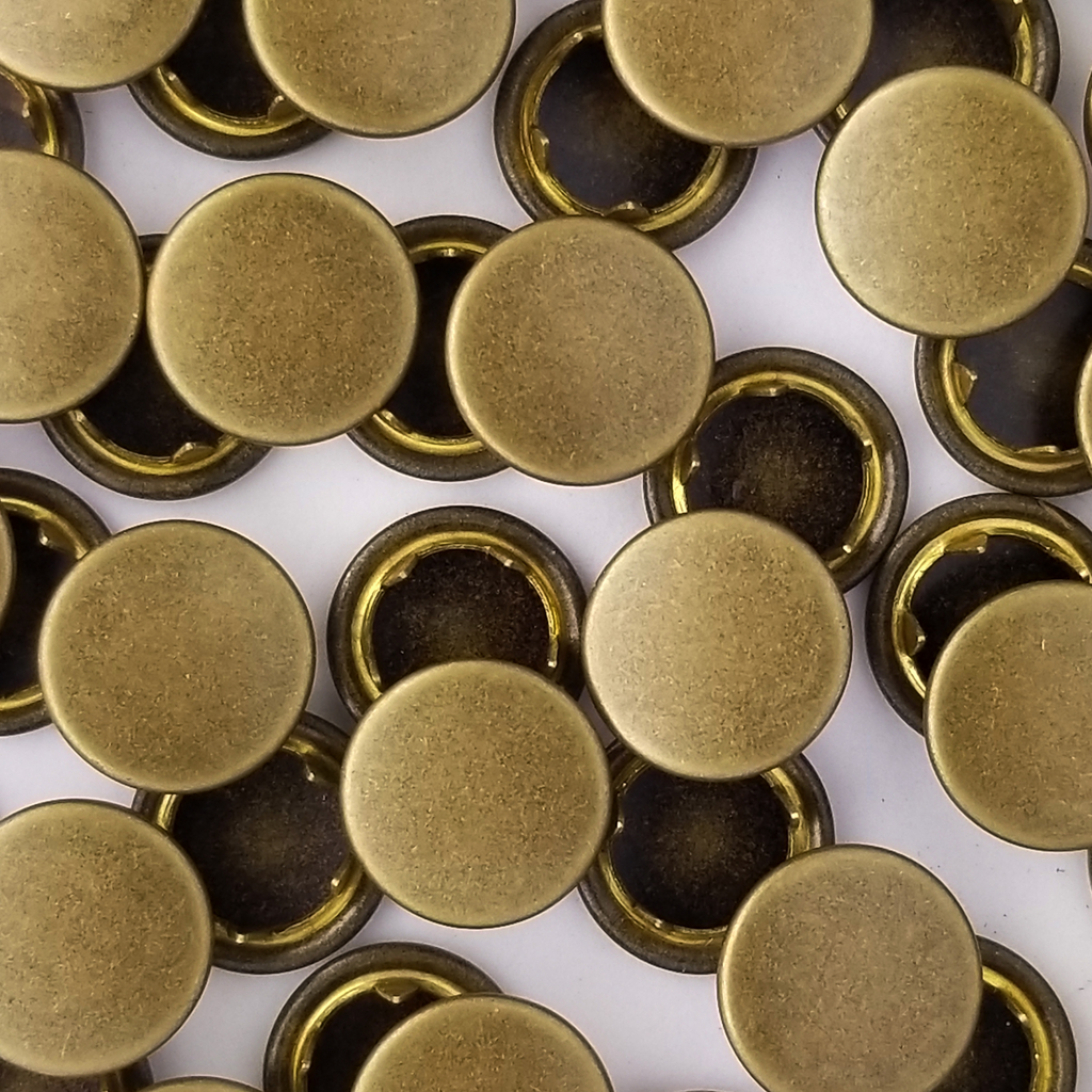 group of the antique brass size 14 capped snaps with a matte finish from Heit's Wholesale bulk sewing supply company