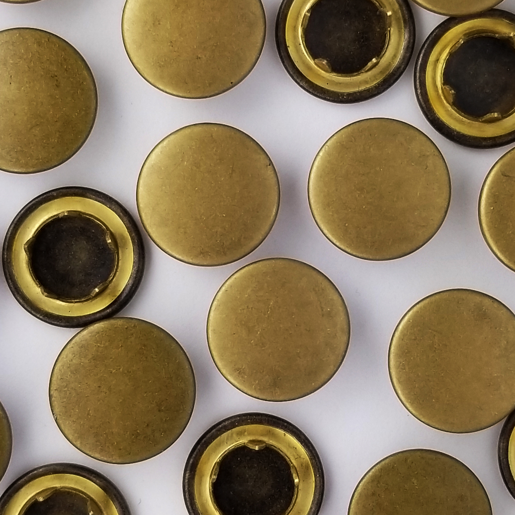 group of the size 20 antique brass size 20 capped gripper snaps from Heit's Wholesale bulk sewing supply company