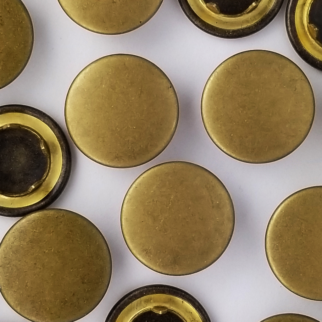 group of the antique brass size 24 capped gripper snaps from Heit's Wholesale bulk sewing supply company