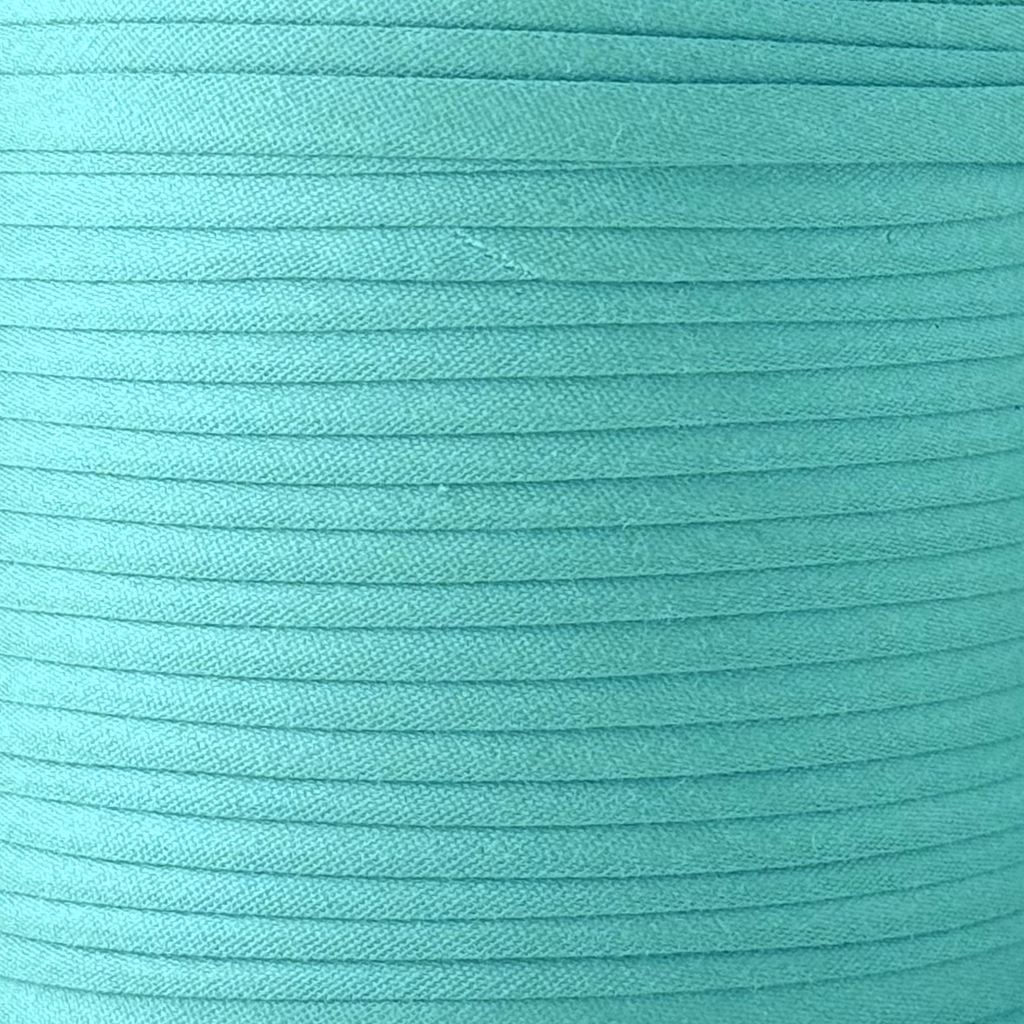 color swatch of the aqua 1/2" single fold bias tape on a spool from Heit's Wholesale bulk sewing supply company