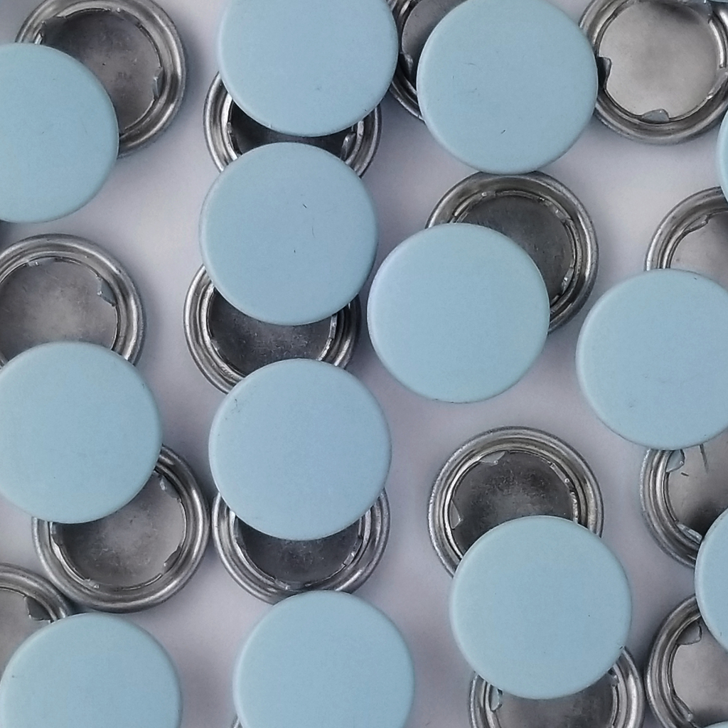 group of the aqua size 14 capped snaps with a matte finish from Heit's Wholesale bulk sewing supply company