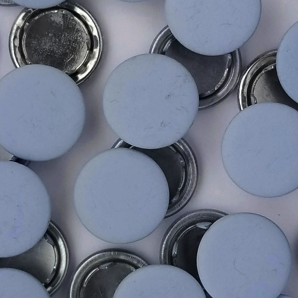 group of the baby blue size 18 capped snaps from Heit's Wholesale bulk sewing supply company 