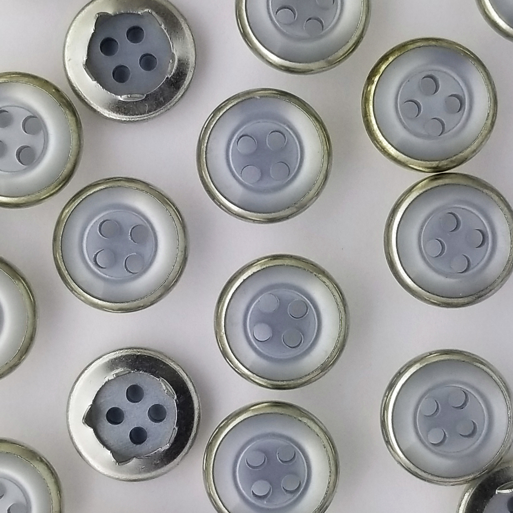 group of the baby blue size 20 button style gripper snaps from Heit's Wholesale bulk sewing supply company