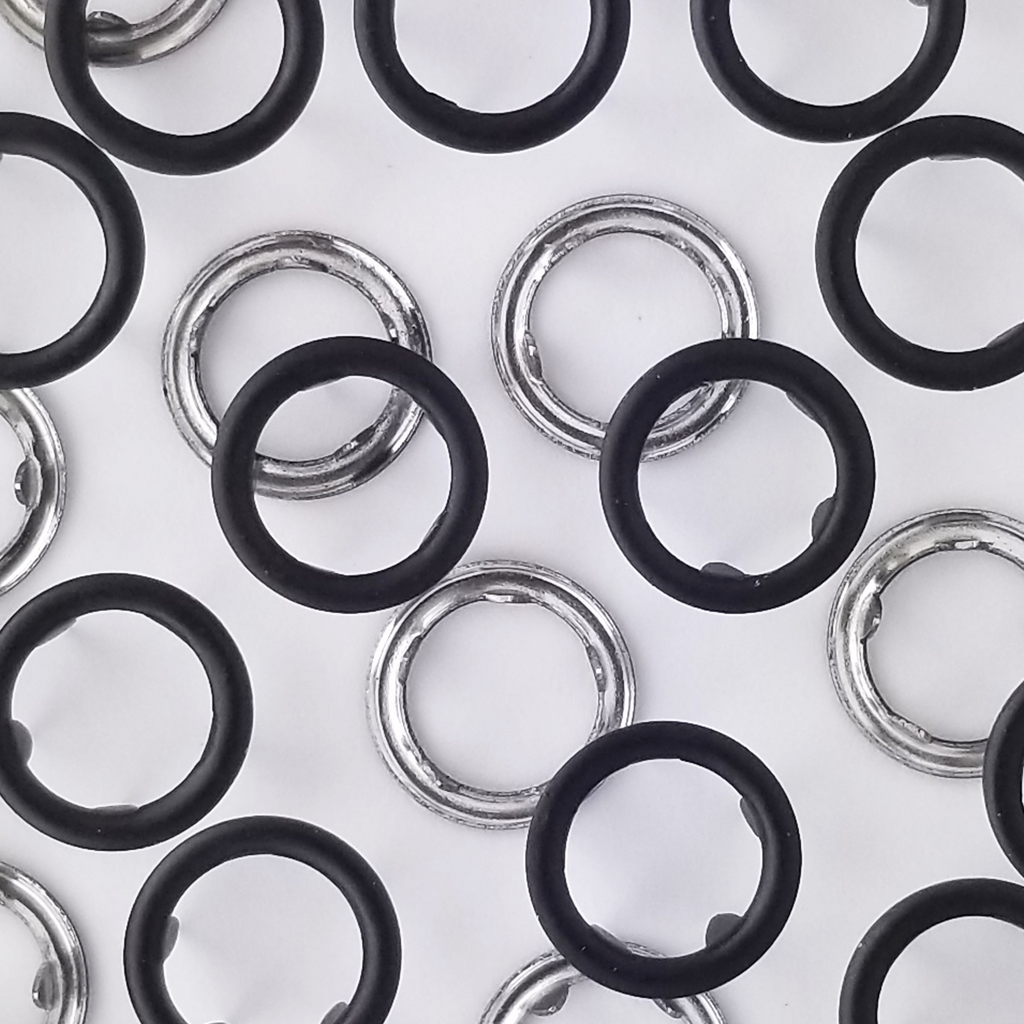 group of the black size 16 open ring snap from Heit's Wholesale bulk sewing supply company 