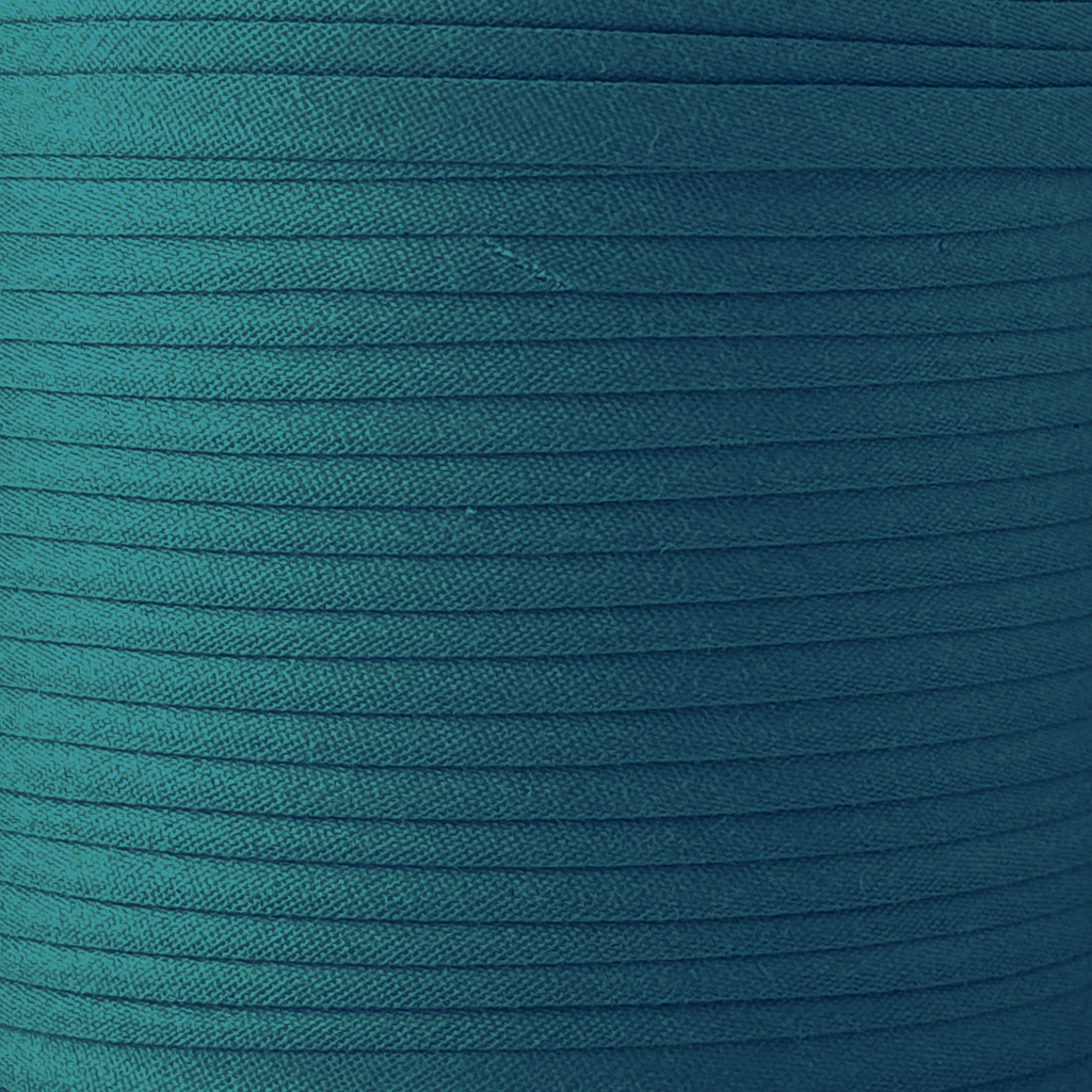 color swatch of the bottle green 1/2" double fold bias tape on a spool from Heit's Wholesale bulk sewing supply company