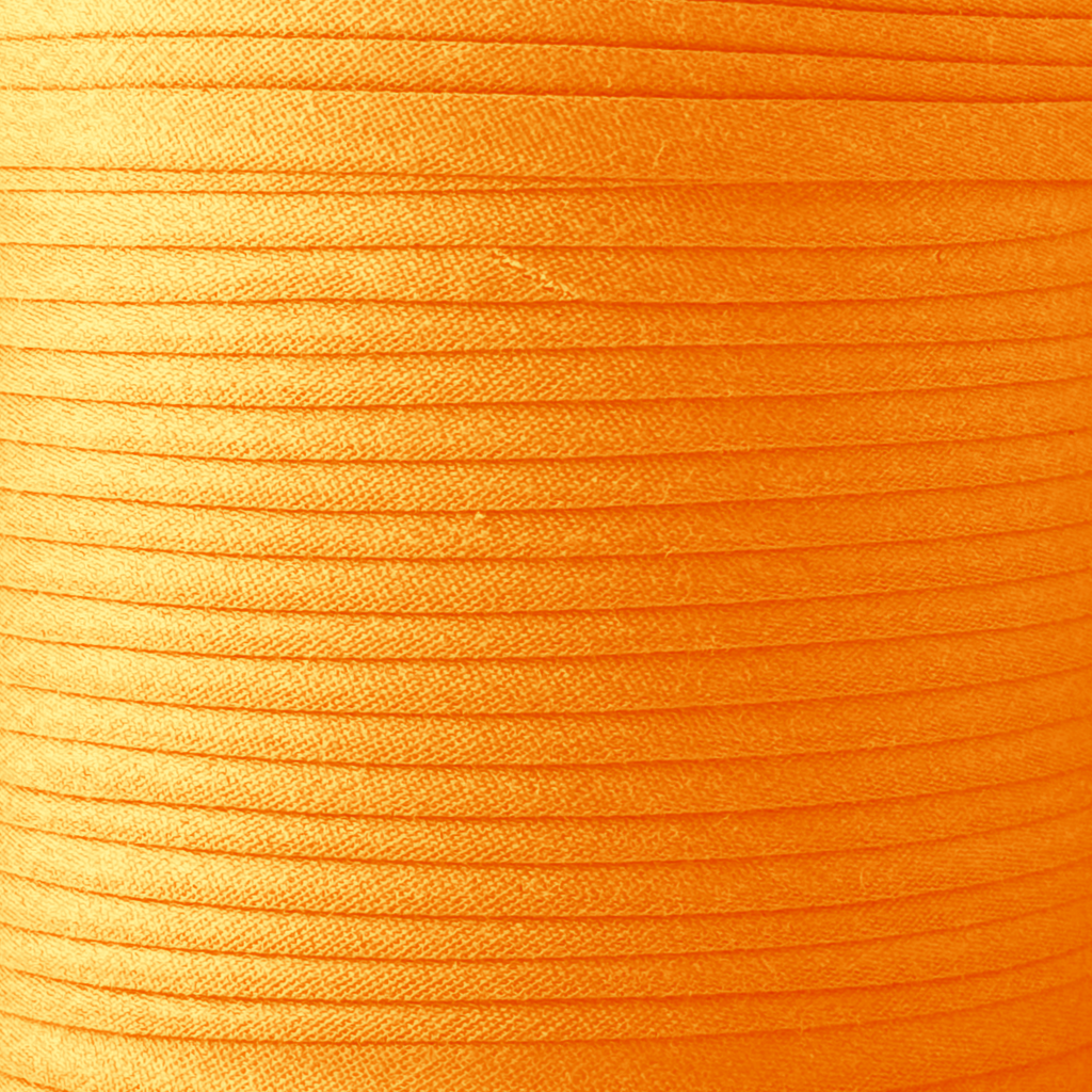 color swatch of the bright orange 1/4" double fold bias tape on a spool from Heit's Wholesale bulk sewing supply company