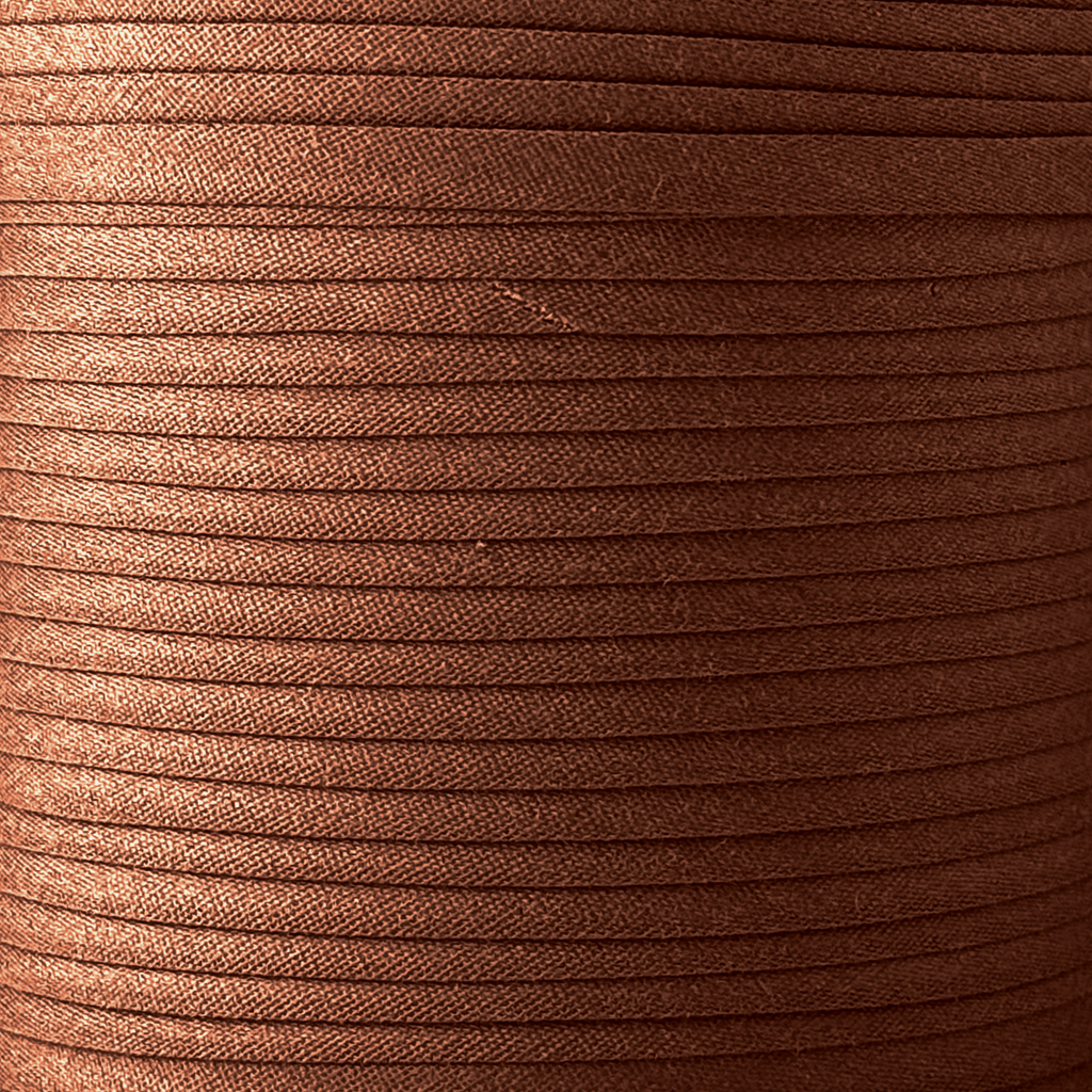 color swatch of the brown 3/8" double fold bias tape on a spool from Heit's Wholesale bulk sewing supply company 