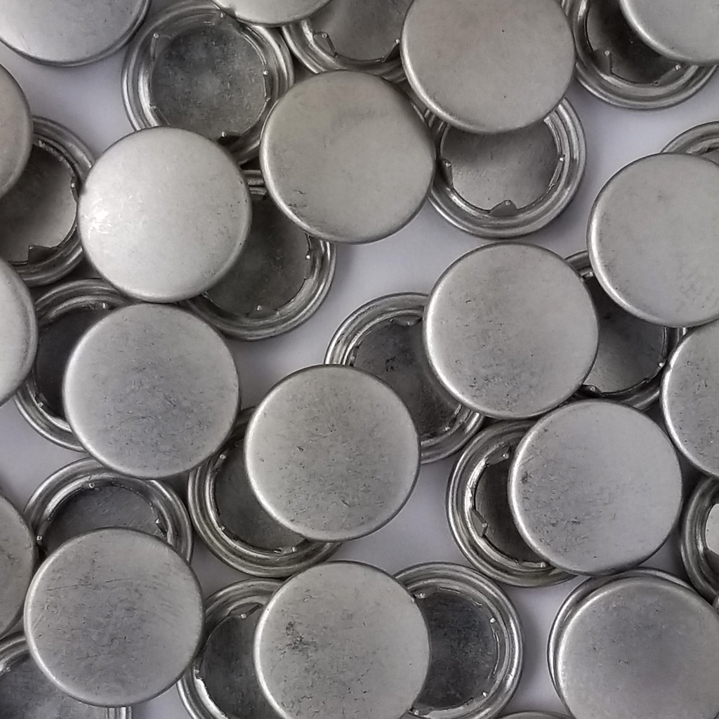 group of the brushed silver size 14 capped snaps with a matte finish from Heit's Wholesale bulk sewing supply company
