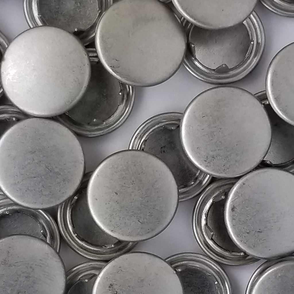 group of the brushed silver size 18 capped snaps from Heit's Wholesale bulk sewing supply company 