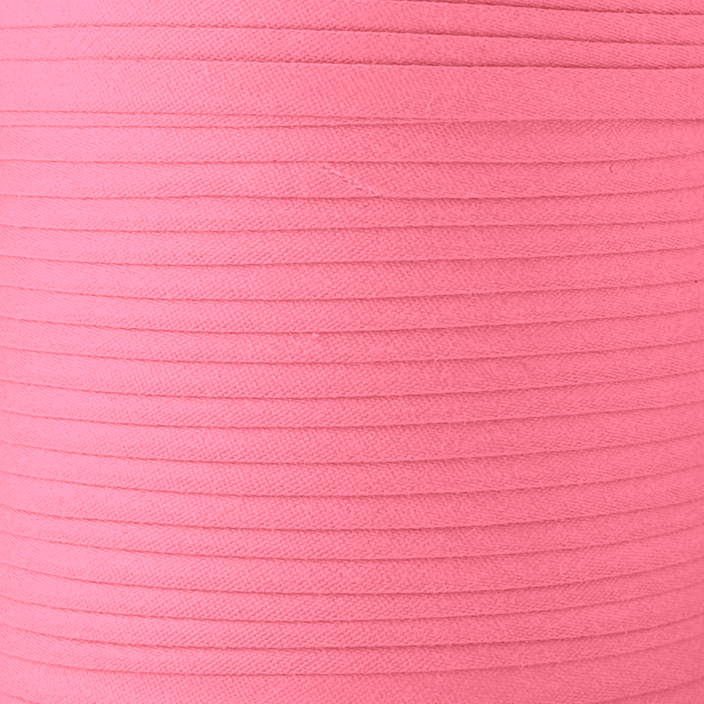 swatch of the bubblegum 1/4" double fold bias tape on a spool from Heit's Wholesale bulk sewing supply company