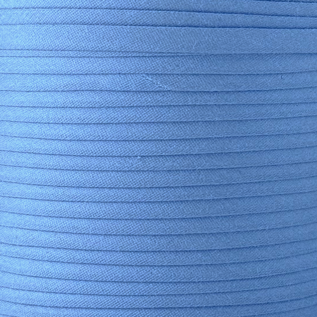 color swatch of the chalet blue 1" double fold bias tape on a roll from Heit's Wholesale bulk sewing supply company