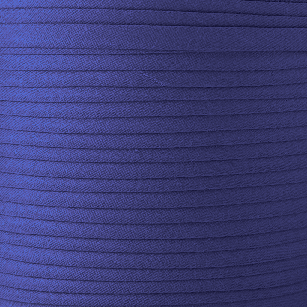 color swatch of the classic blue 1/2" double fold bias tape on a spool from Heit's Wholesale bulk sewing supply company