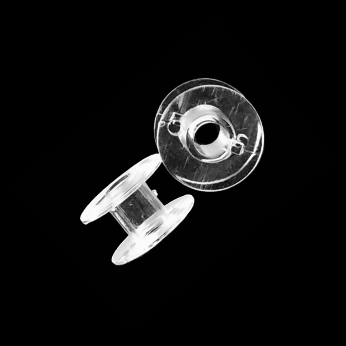 clear plastic bobbins from Heit's Wholesale bulk sewing supply company