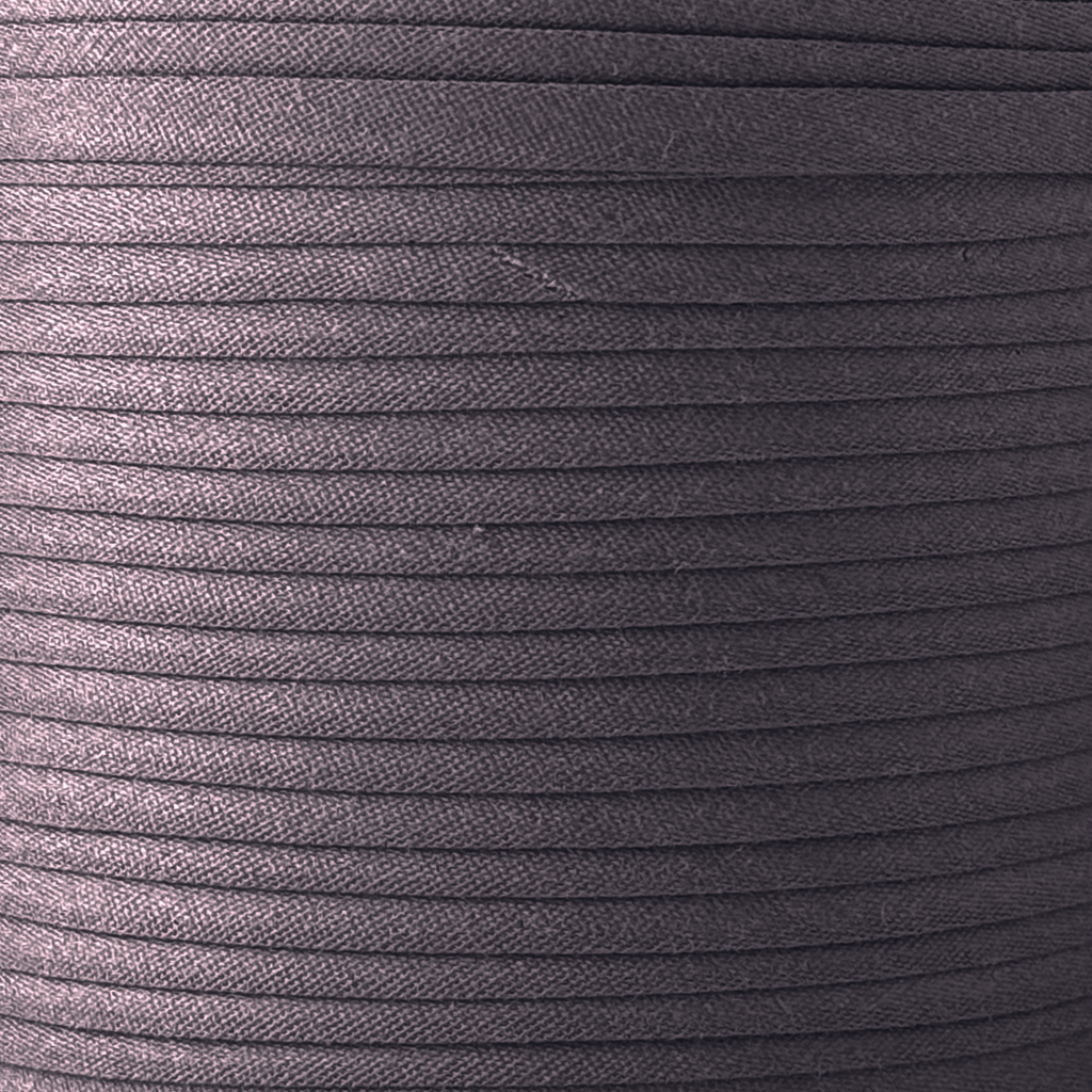 color swatch of the coal dust 1/2" double fold bias tape on a spool from Heit's Wholesale bulk sewing supply company