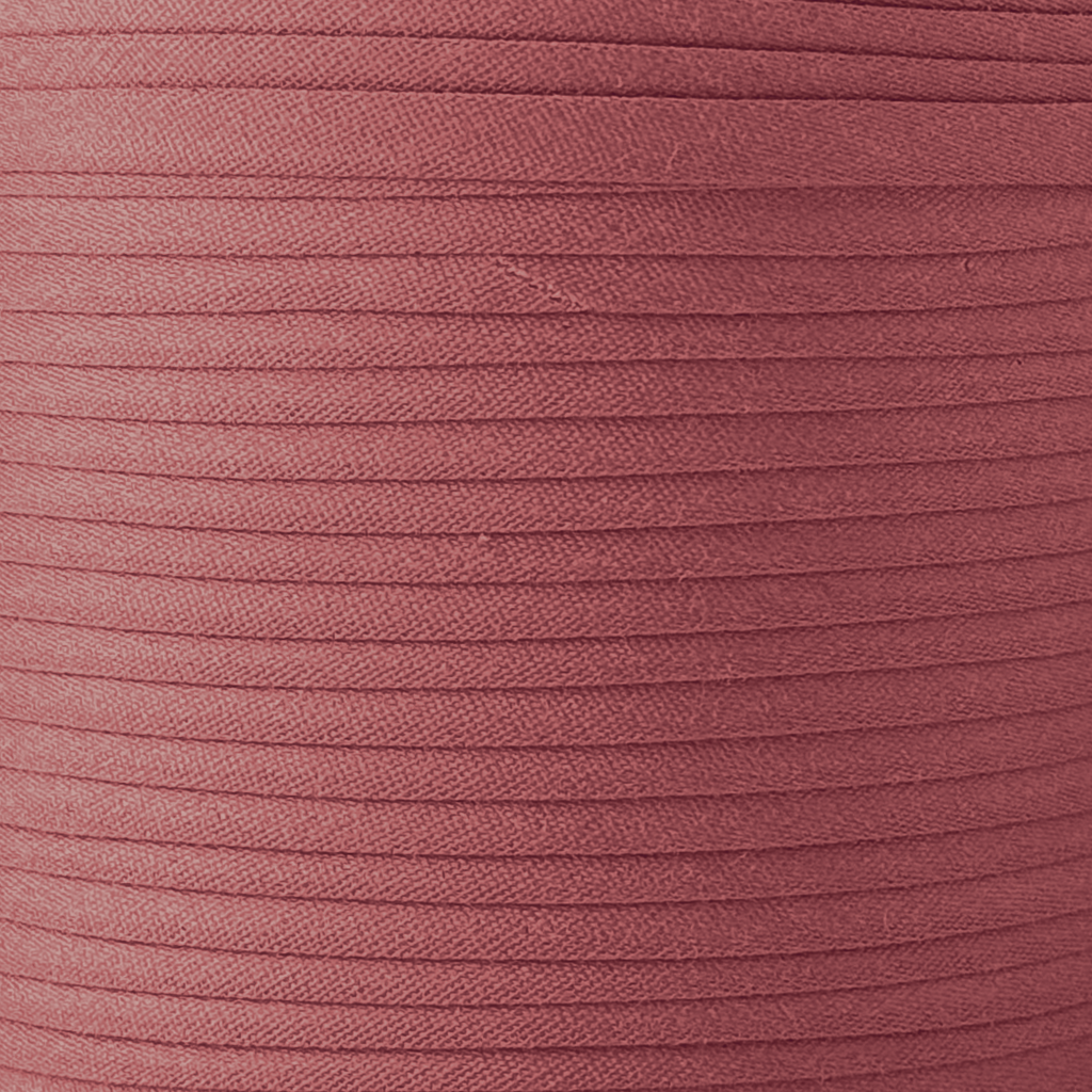 color swatch of the copper 1" no gap single fold bias tape on a roll from Heit's Wholesale bulk sewing supply company