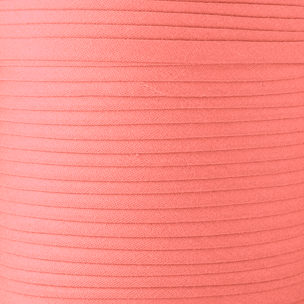color swatch of the coral 1/4" double fold bias tape on a spool from Heit's Wholesale bulk sewing supply company