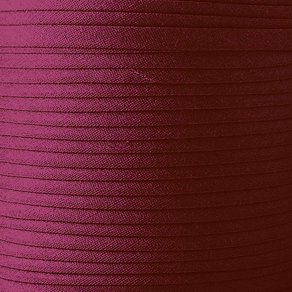 color swatch of the cranberry 3/8" double fold bias tape on a spool from Heit's Wholesale bulk sewing supply company 