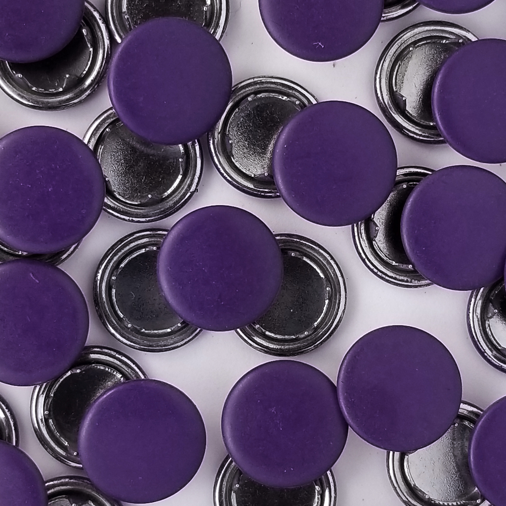 group of the eggplant size 14 capped snaps with a matte finish from Heit's Wholesale bulk sewing supply company