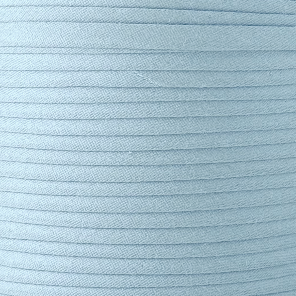 color swatch of the gay blue 1/4" double fold bias tape on a spool from Heit's Wholesale bulk sewing supply company