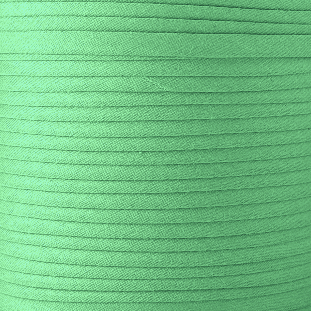 color swatch of the gypsy green 1/2" double fold bias tape on a spool from Heit's Wholesale bulk sewing supply company