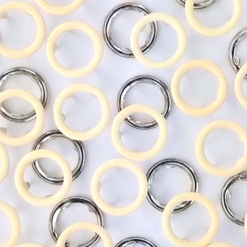 close up of the lemon size 14 open ring snap from Heit's Wholesale bulk sewing supply company