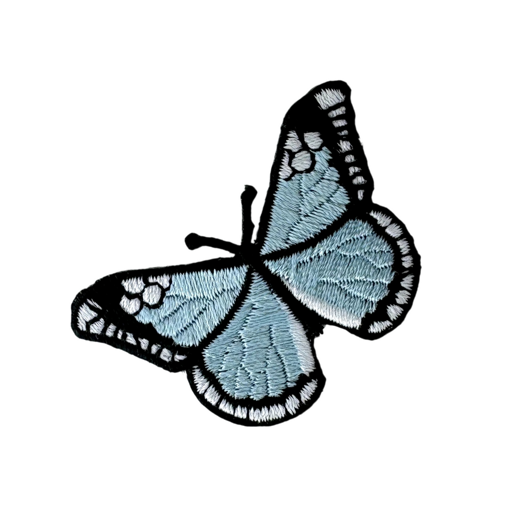 light blue butterfly applique from Heit's Wholesale bulk sewing supply company