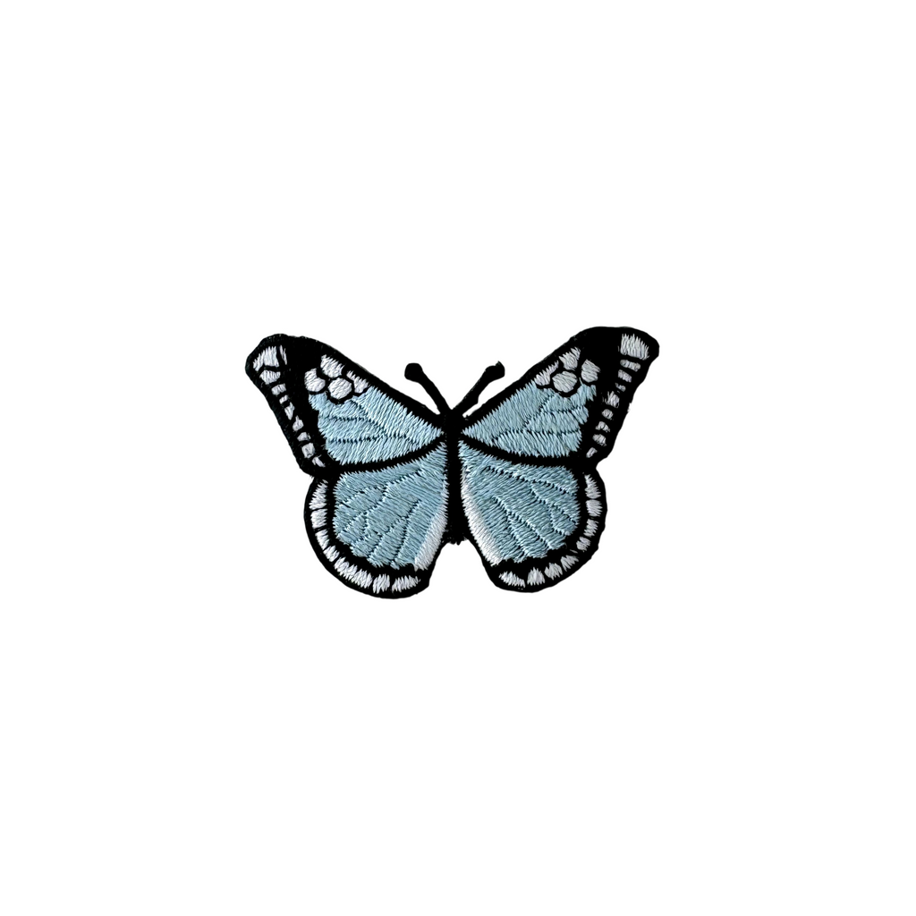 light blue butterfly applique from Heit's Wholesale bulk sewing supply company