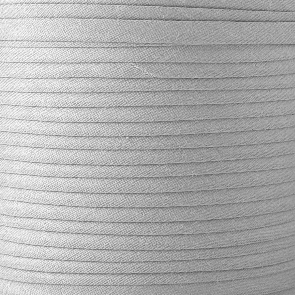 color swatch of the light gray 1" double fold bias tape on a roll from Heit's Wholesale bulk sewing supply company