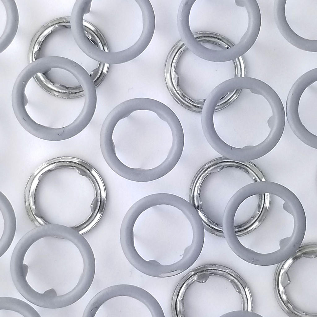 group of the light gray size 16 open ring snaps from Heit's Wholesale bulk sewing supply company