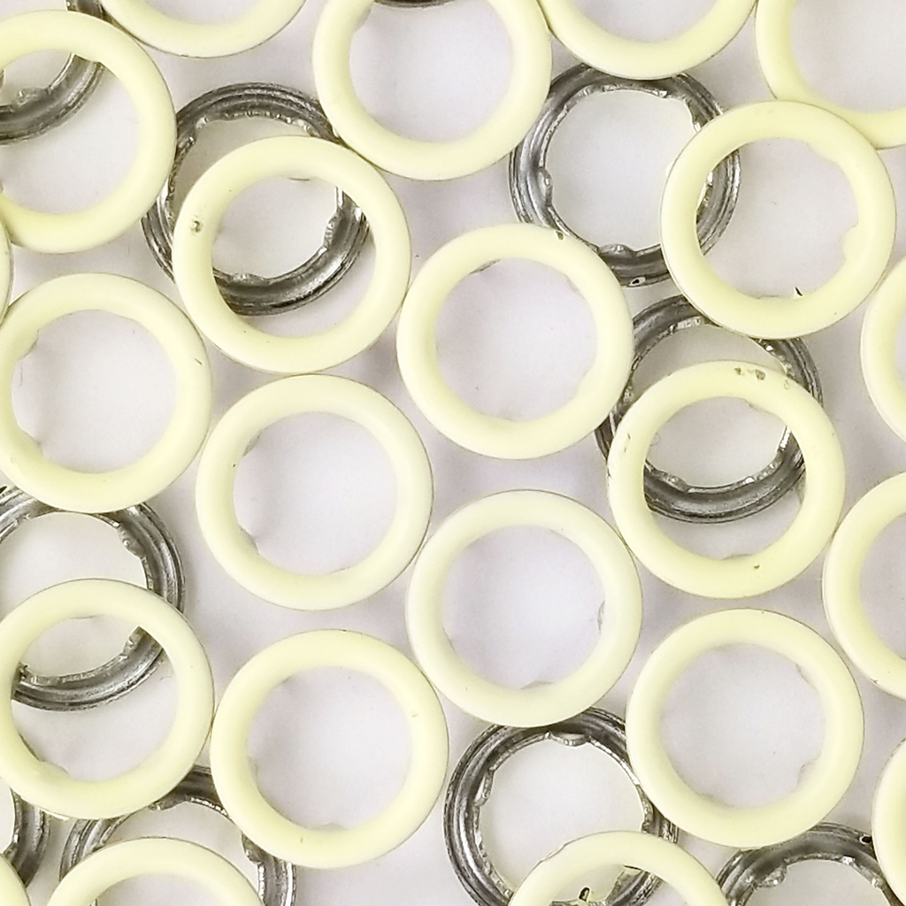 group of the pale yellow size 16 open ring snap from Heit's Wholesale bulk sewing supply company 